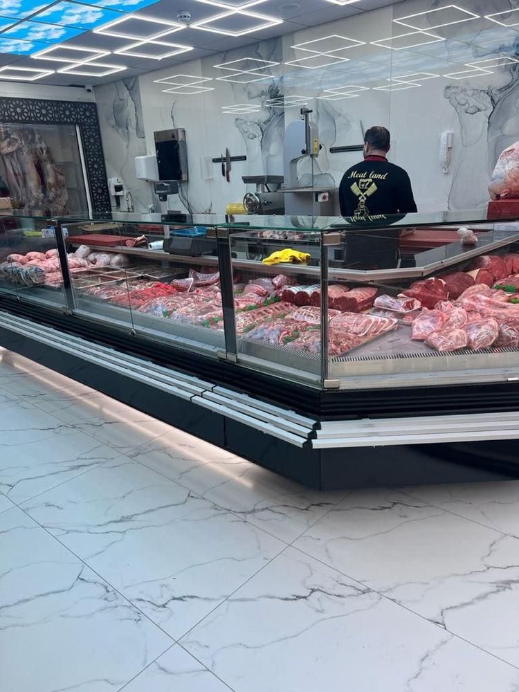 The length of the shop and its display counter seen from the door
